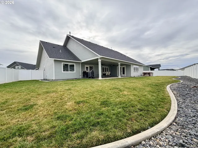 a view of a house with a garden