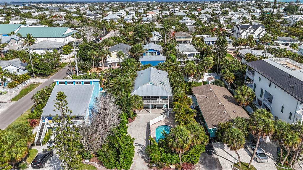 315 Spring Avenue Anna Maria, FL 34216 - Photo 50 of 63 an aerial view of residential houses with outdoor space