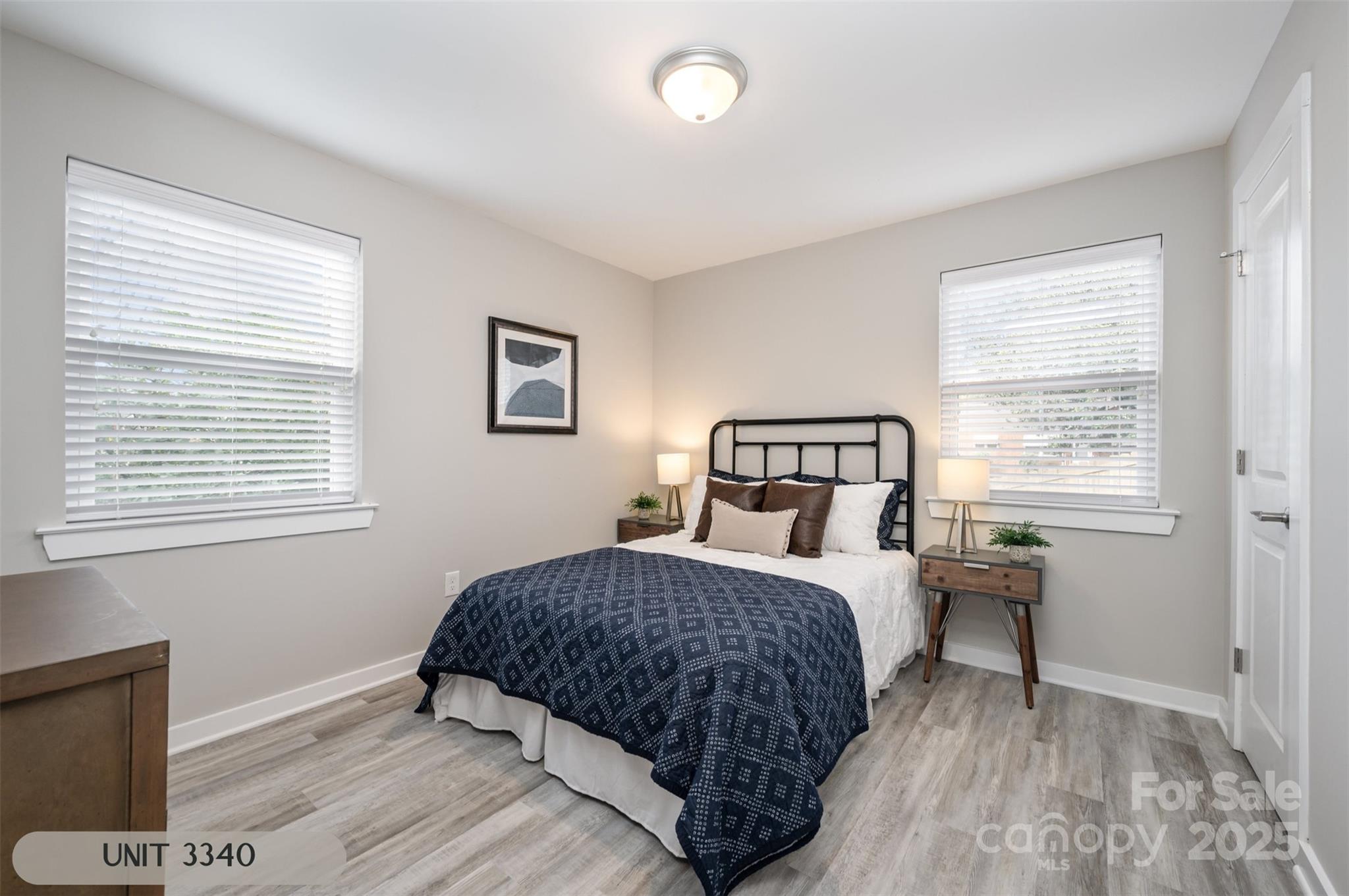 3342 Washburn Avenue Charlotte, NC 28205 - Photo 21 of 45 a bedroom with a bed and a window