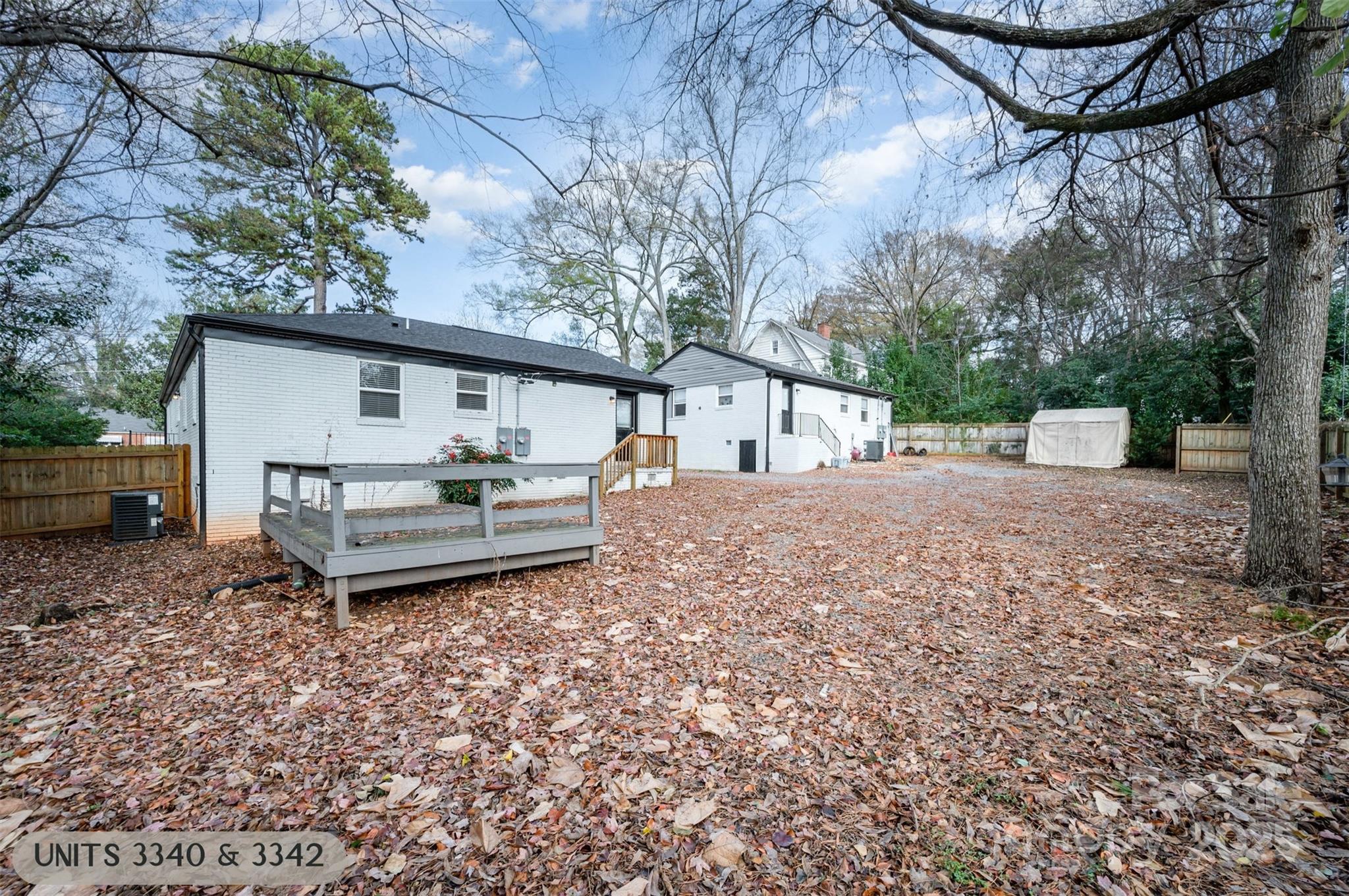3342 Washburn Avenue Charlotte, NC 28205 - Photo 27 of 45 a white house that has a tree in front of it