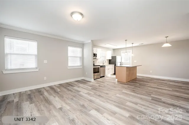 a view of a kitchen with a sink
