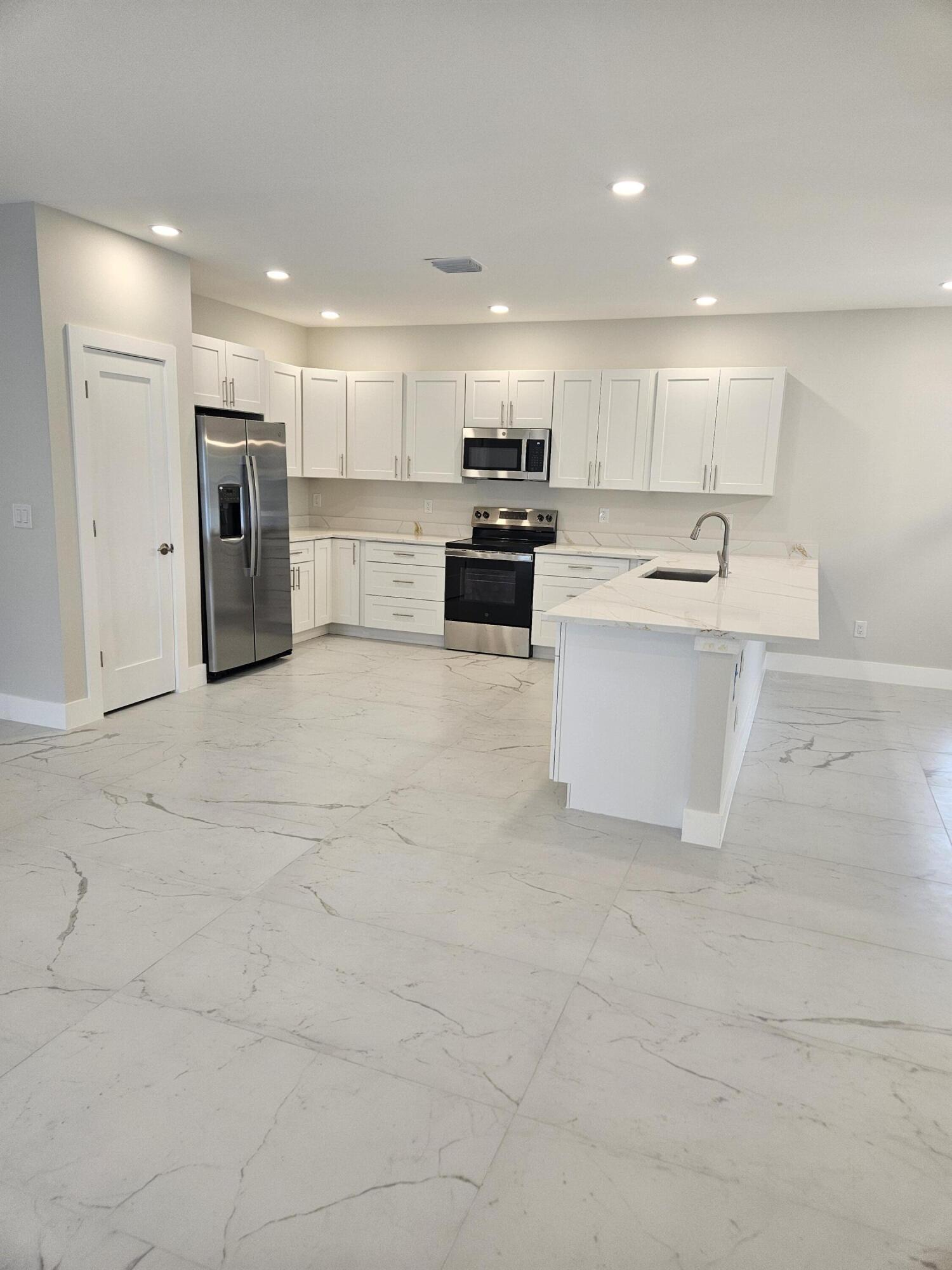 3878 Southeast Grant Street Stuart, FL 34997 - Photo 8 of 38 20260130_143612