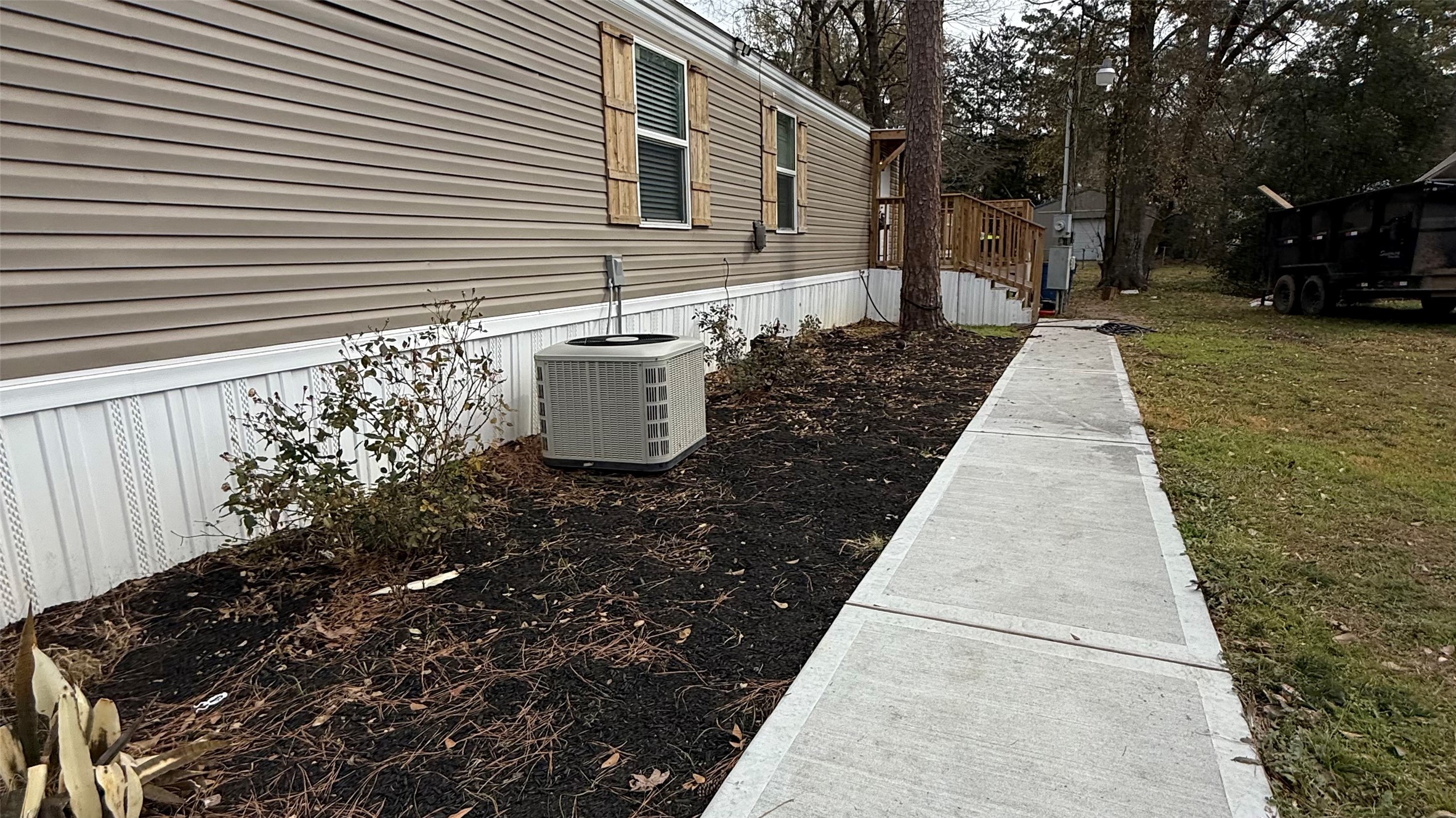14348 West Ravine Run Willis, TX 77318 - Photo 2 of 15 a front view of a house with a yard