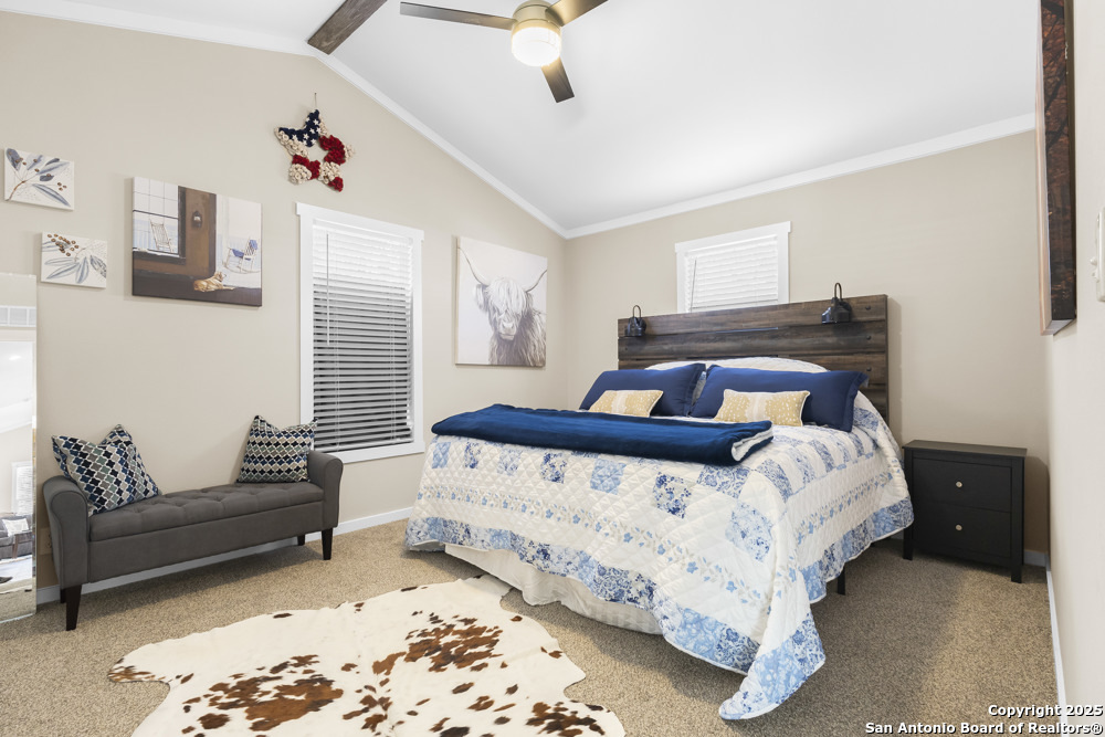 164 Private 1523 Bandera, TX 78003 - Photo 13 of 44 a bedroom with a bed and a couch