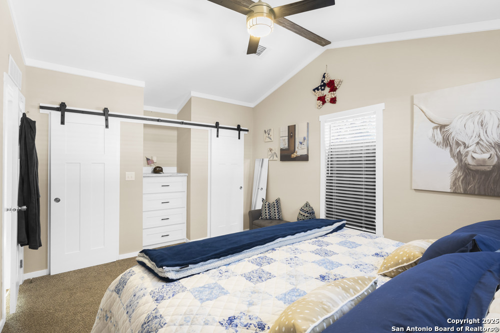 164 Private 1523 Bandera, TX 78003 - Photo 14 of 44 a bedroom with a bed and a window