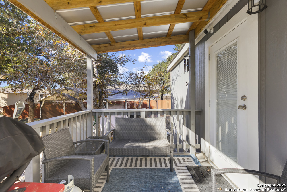 164 Private 1523 Bandera, TX 78003 - Photo 20 of 44 a view of balcony with wooden floor