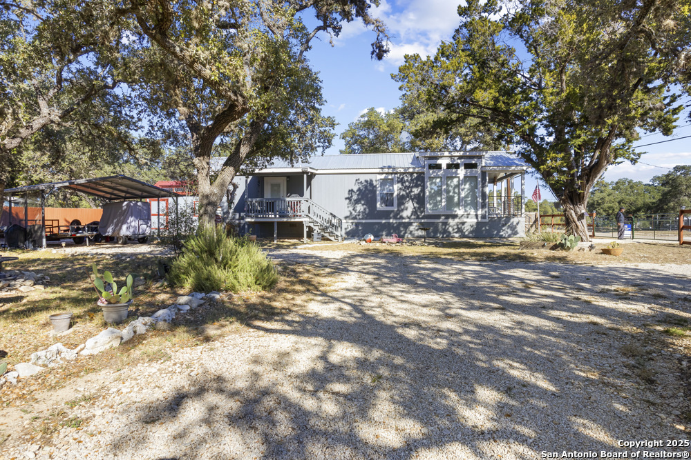 164 Private 1523 Bandera, TX 78003 - Photo 22 of 44 a view of a town with large trees