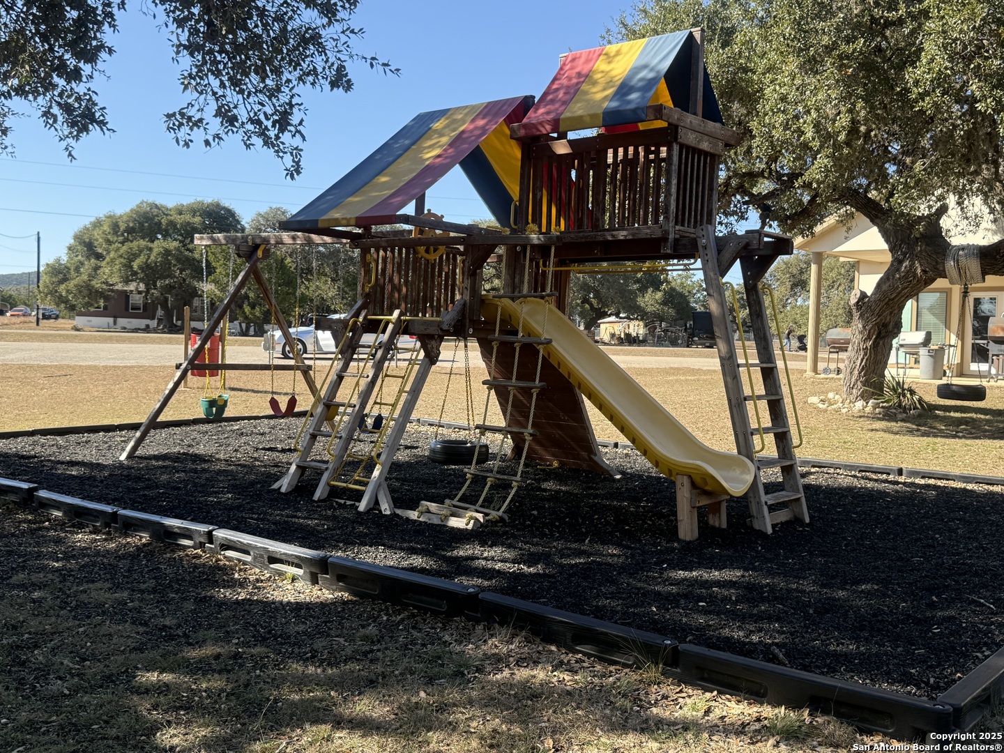 164 Private 1523 Bandera, TX 78003 - Photo 41 of 44 a front view of a house with a yard