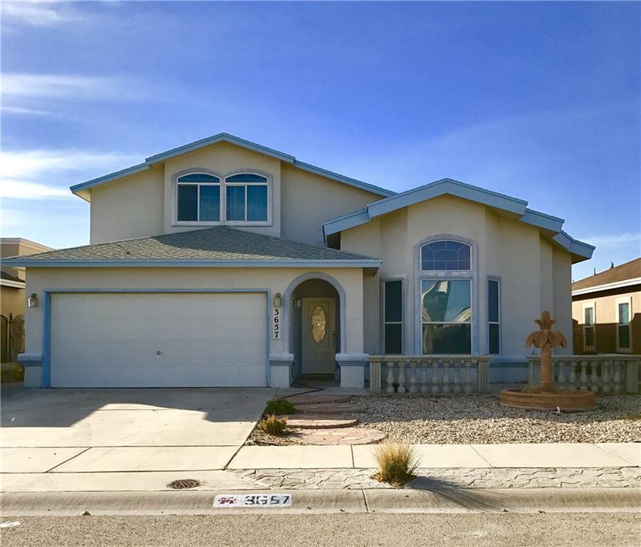 3657 Sammy Reece PIace El Paso, TX 79938 - Photo 1 of 1 a front view of a house with garage