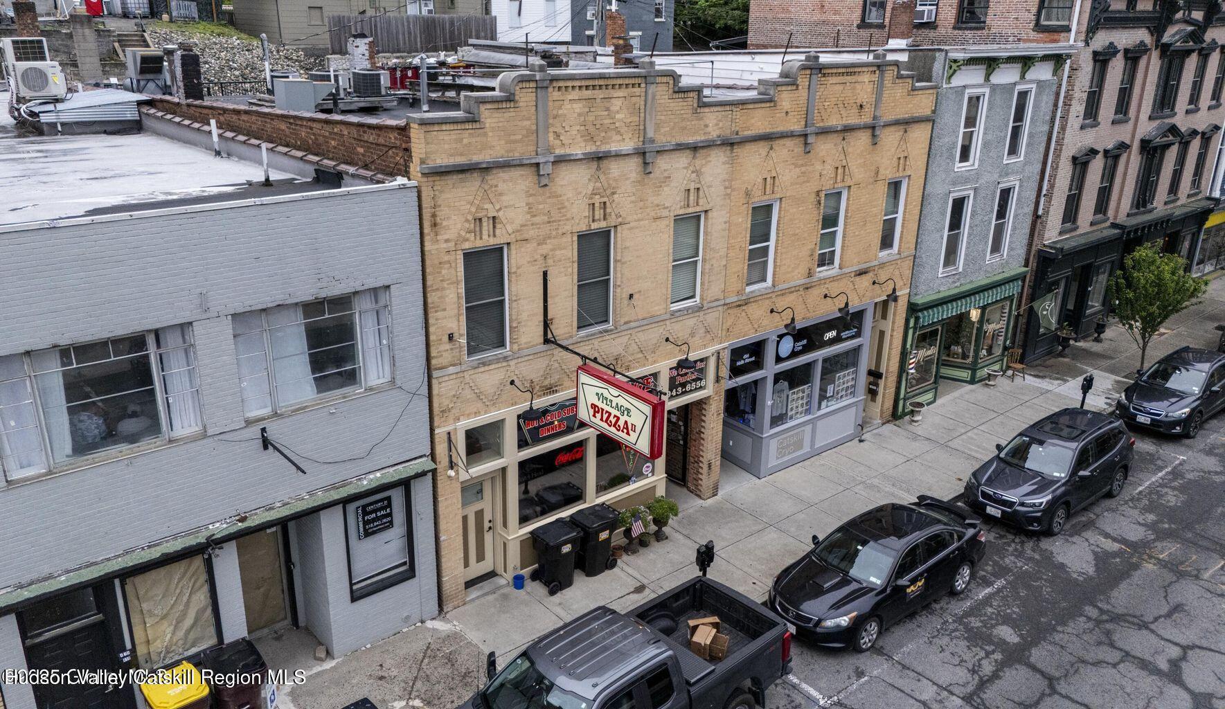 416 Main Street Catskill, NY 12414 - Photo 12 of 12 a view of a building with many windows