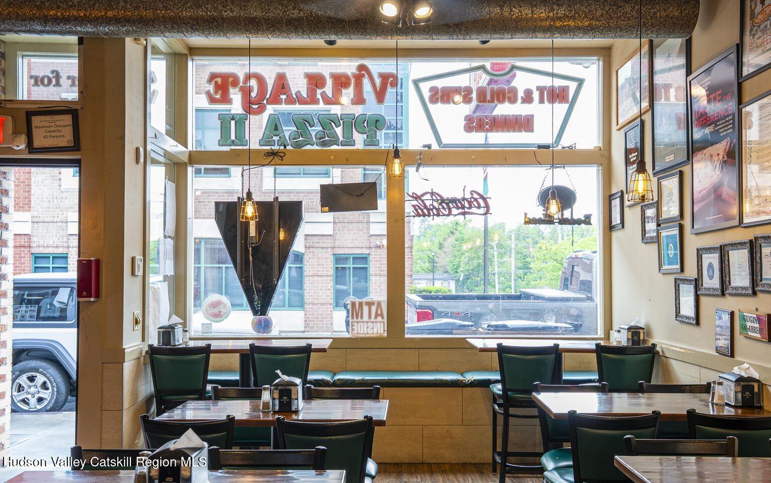 416 Main Street Catskill, NY 12414 - Photo 2 of 12 a view of a workspace with a window
