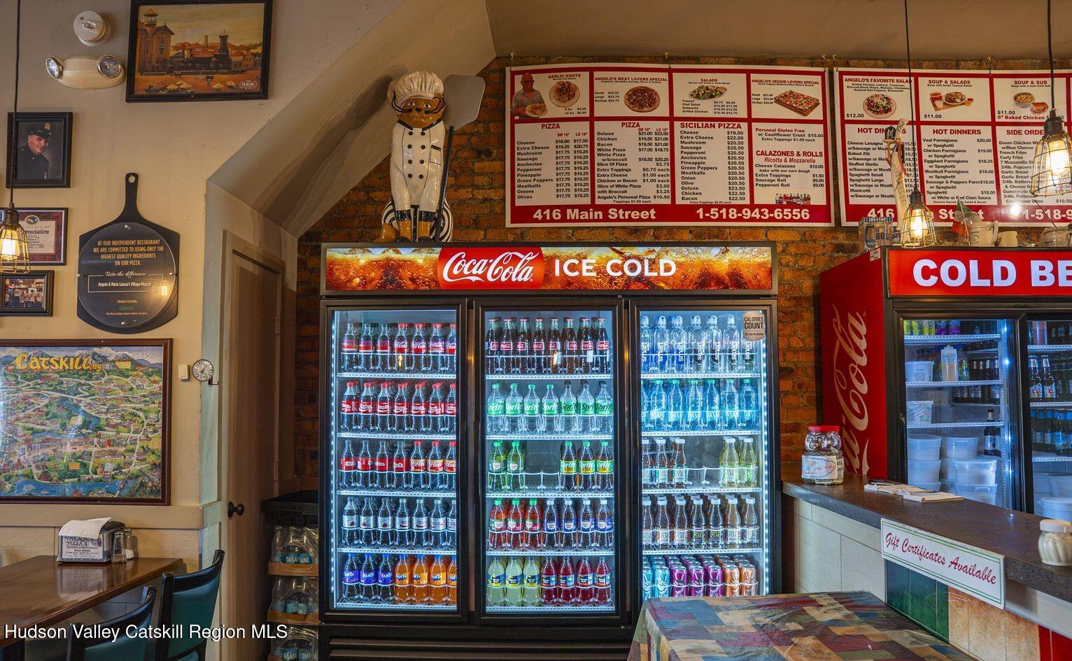 416 Main Street Catskill, NY 12414 - Photo 4 of 12 a front view of a building with glass windows
