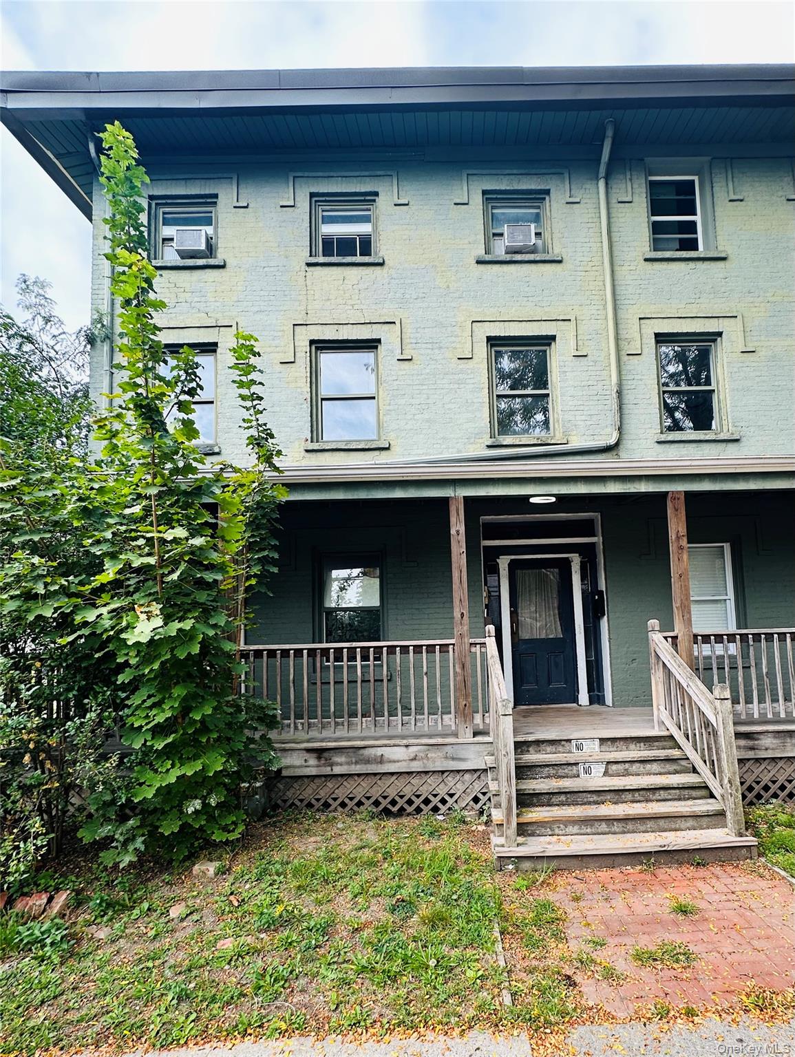 78 Garden Street, Unit B Poughkeepsie, NY 12601 - Photo 1 of 1 View of front of property featuring covered porch and brick siding
