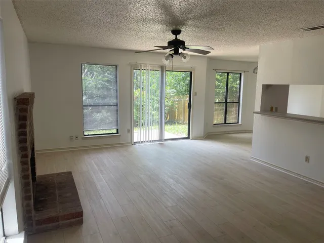 a view of livingroom with hardwood floor and window