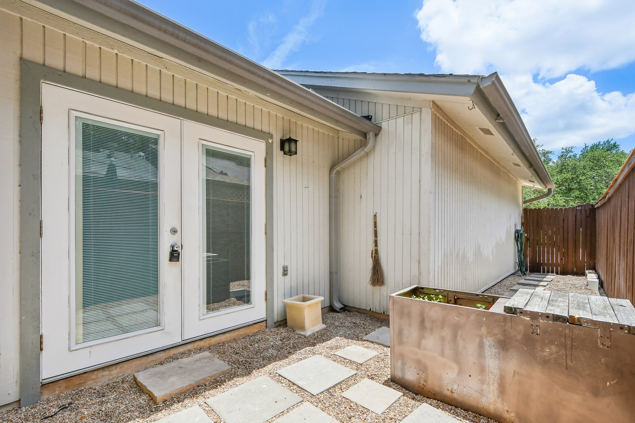 4202 Hudson Bend Road, Unit B Austin, TX 78734 - Photo 22 of 26 a view of a house with a glass door
