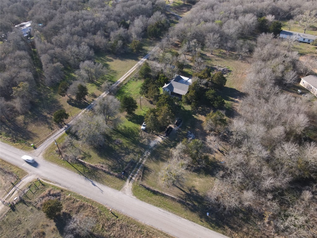 221 Lower Elgin Road Elgin, TX 78621 - Photo 2 of 8 a view of a forest with a forest