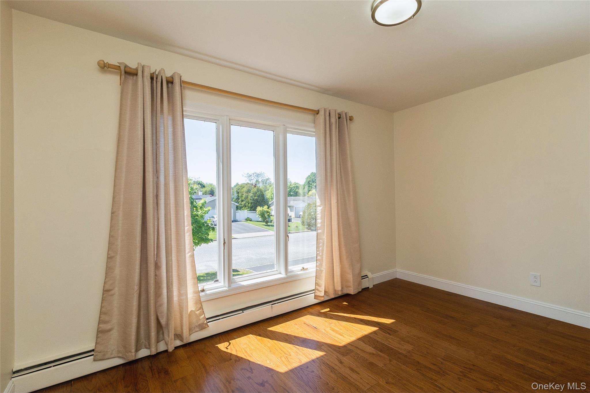 51 Oleeta Road Mount Sinai, NY 11766 - Photo 21 of 29 Third Bedroom