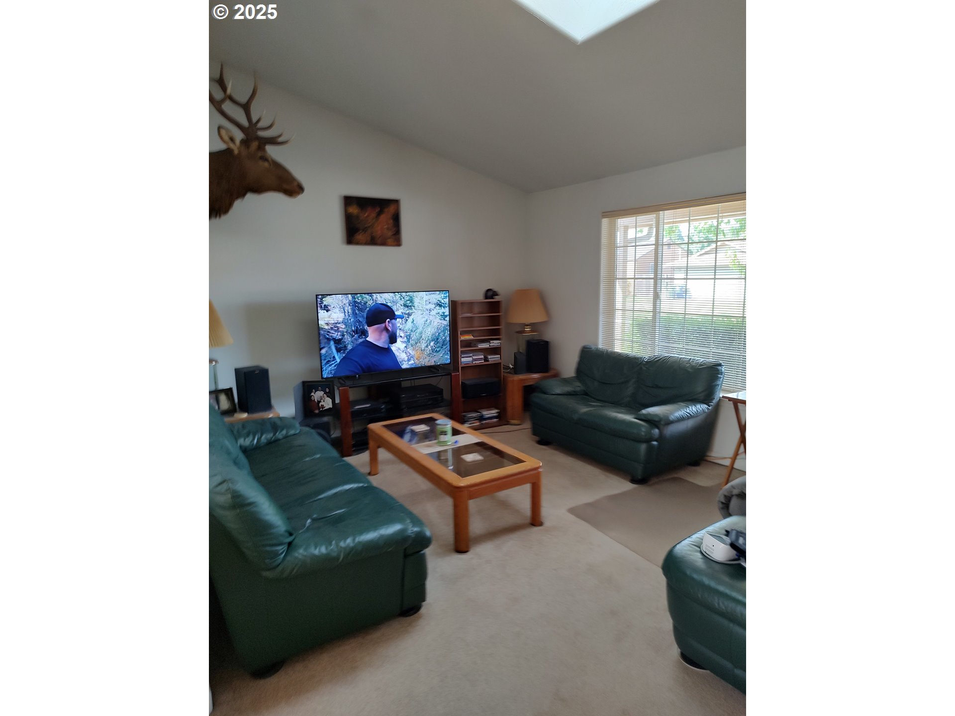 549 South 34th Street Springfield, OR 97478 - Photo 3 of 7 a living room with furniture and a flat screen tv