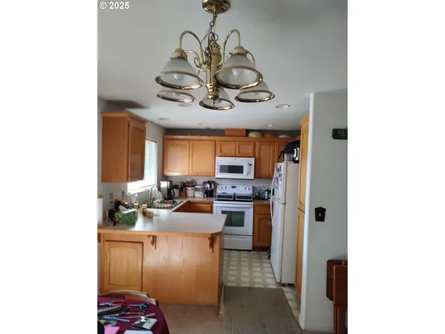 a view of a livingroom with furniture and window