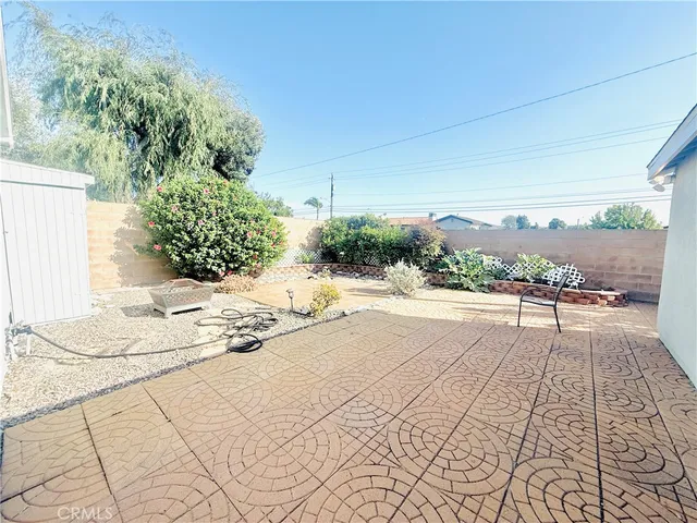 a view of balcony and yard