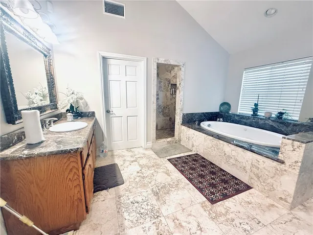 a bedroom with a bed and a stove