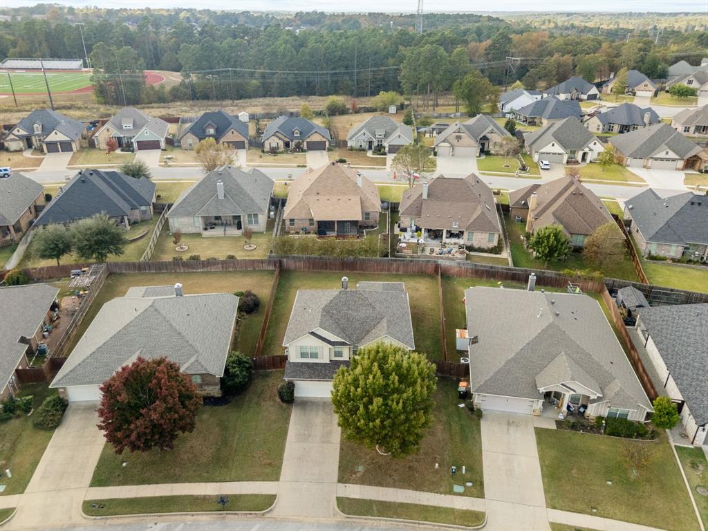 6679 Lacebark Circle Tyler, TX 75703 - Photo 36 of 38 an aerial view of residential houses with outdoor space