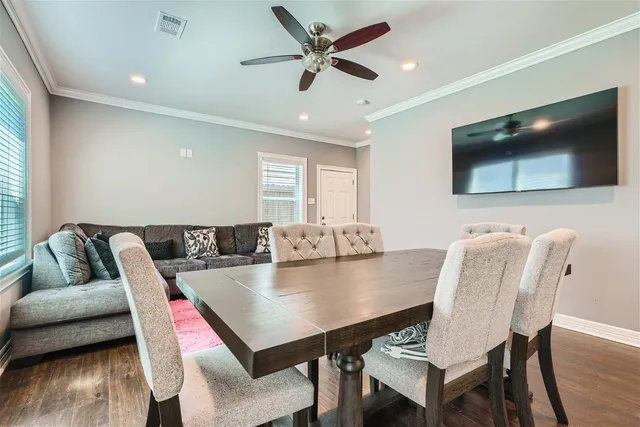 a view of a dining room with furniture