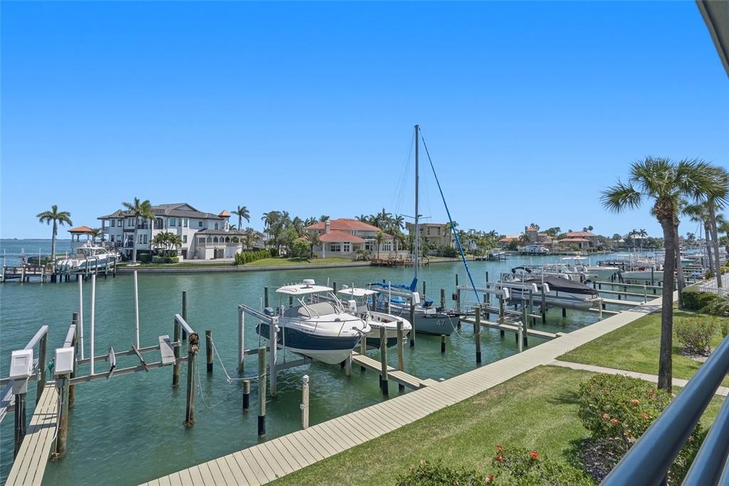 363 Pinellas Bayway South, Unit 29 Tierra Verde, FL 33715 - Photo 33 of 59 a view of a lake with boats next to a bridge
