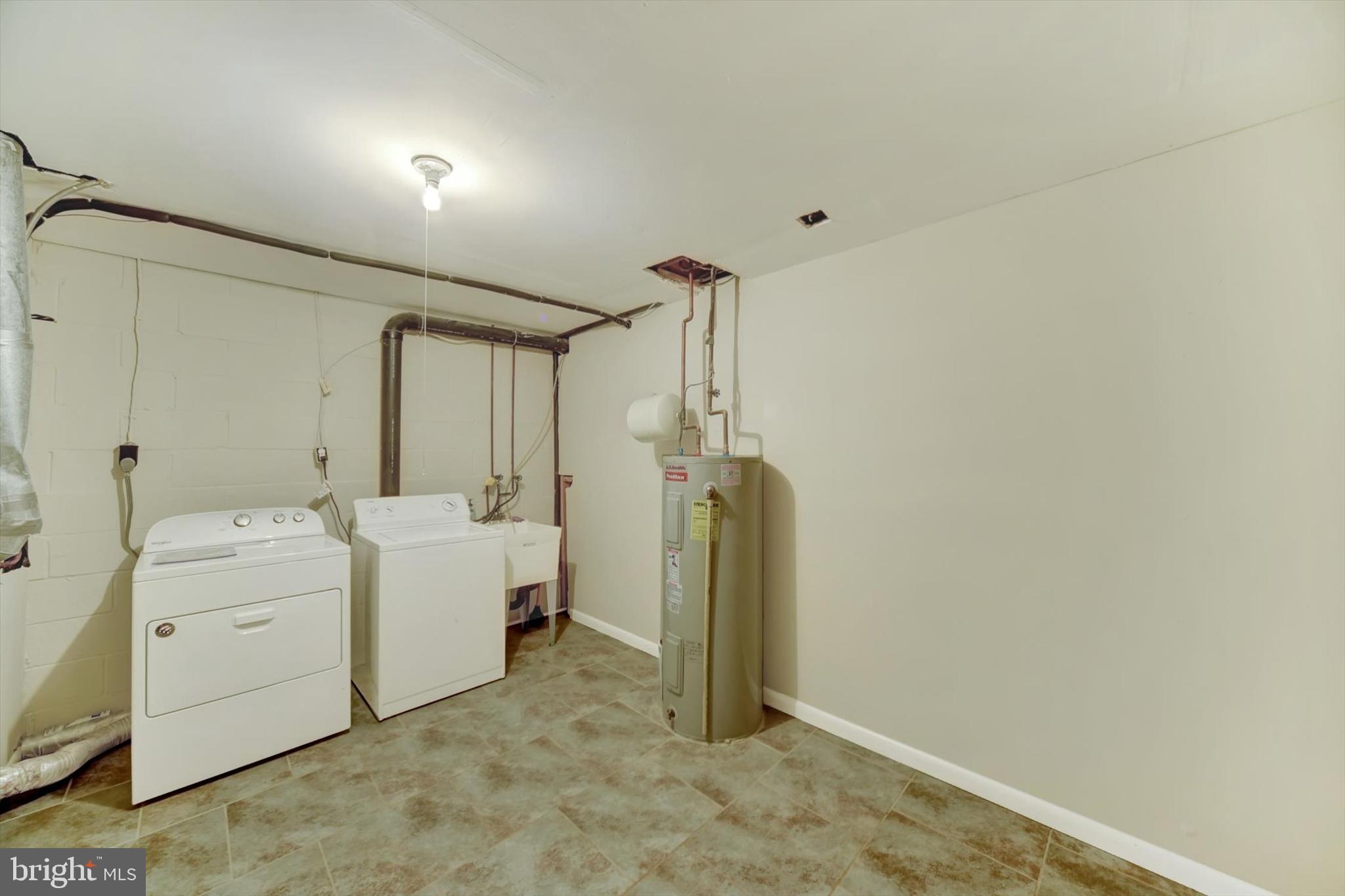 413 Colonial Ridge Lane Arnold, MD 21012 - Photo 23 of 25 Basement laundry/ storage room