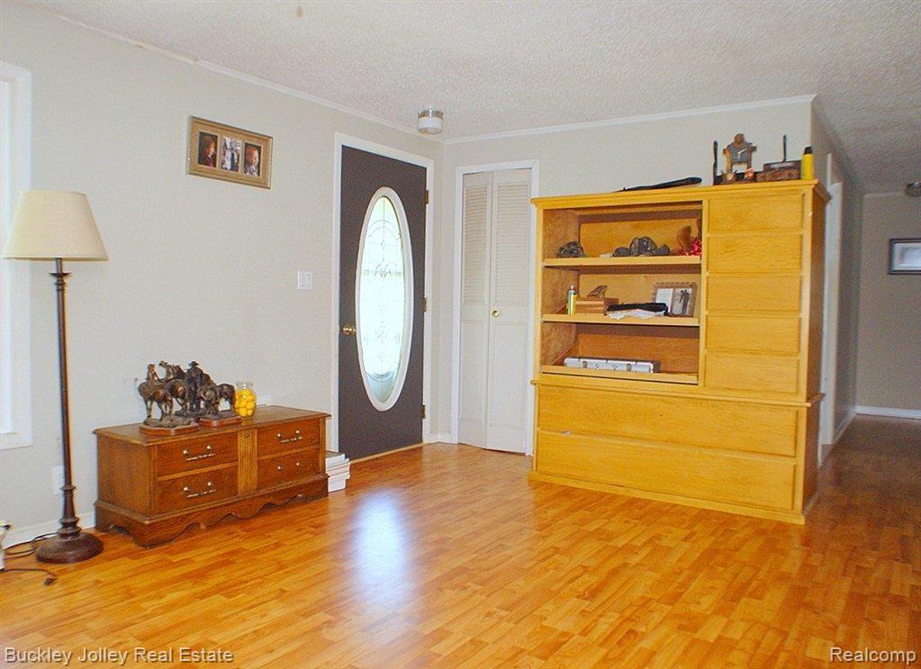 15007 Roepke Road Gregory, MI 48137 - Photo 6 of 18 Laminate Flooring.JPG