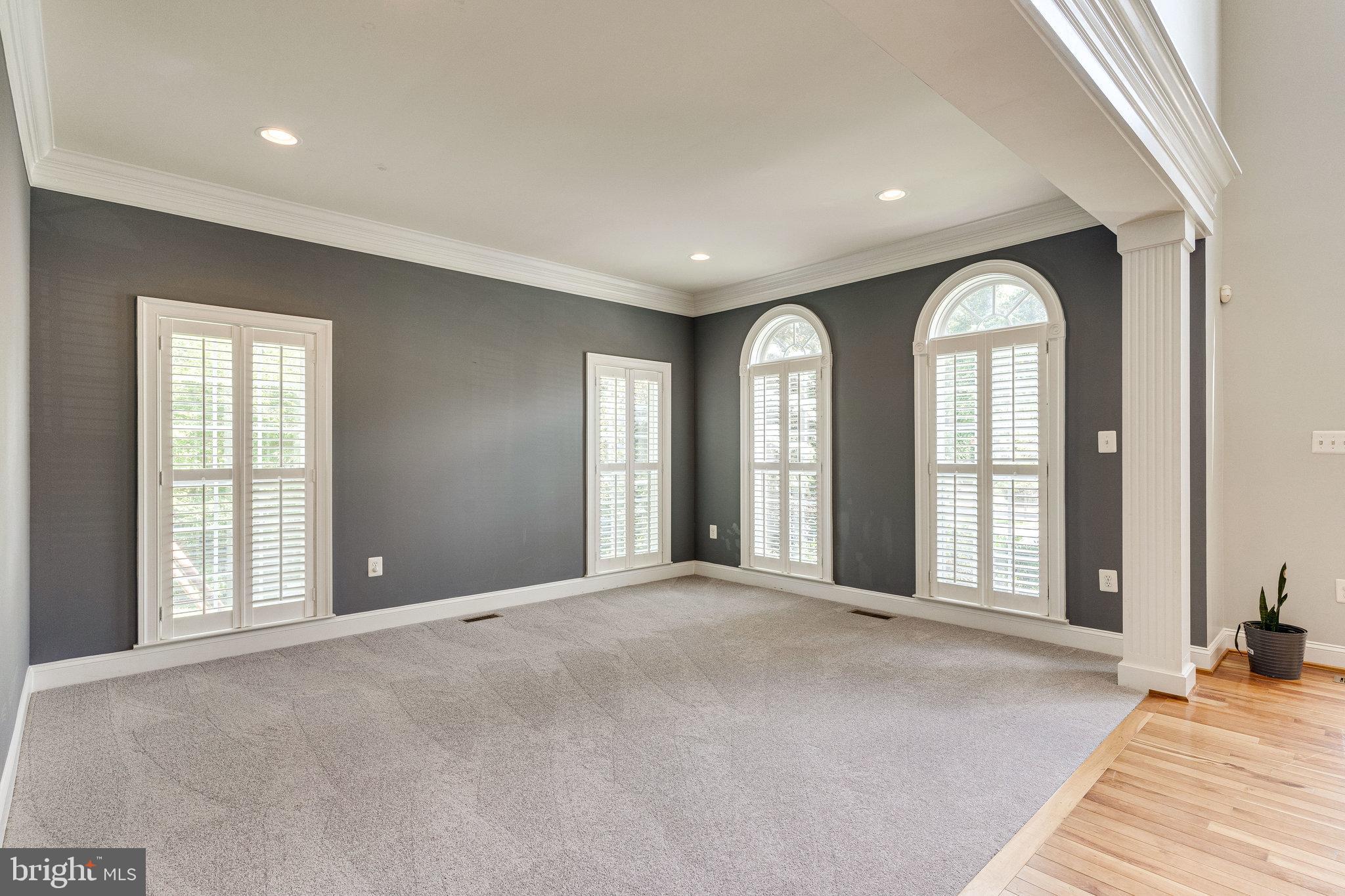 6825 Williamsburg Boulevard Arlington, VA 22213 - Photo 16 of 55 Formal living room w/floor to ceiling windows