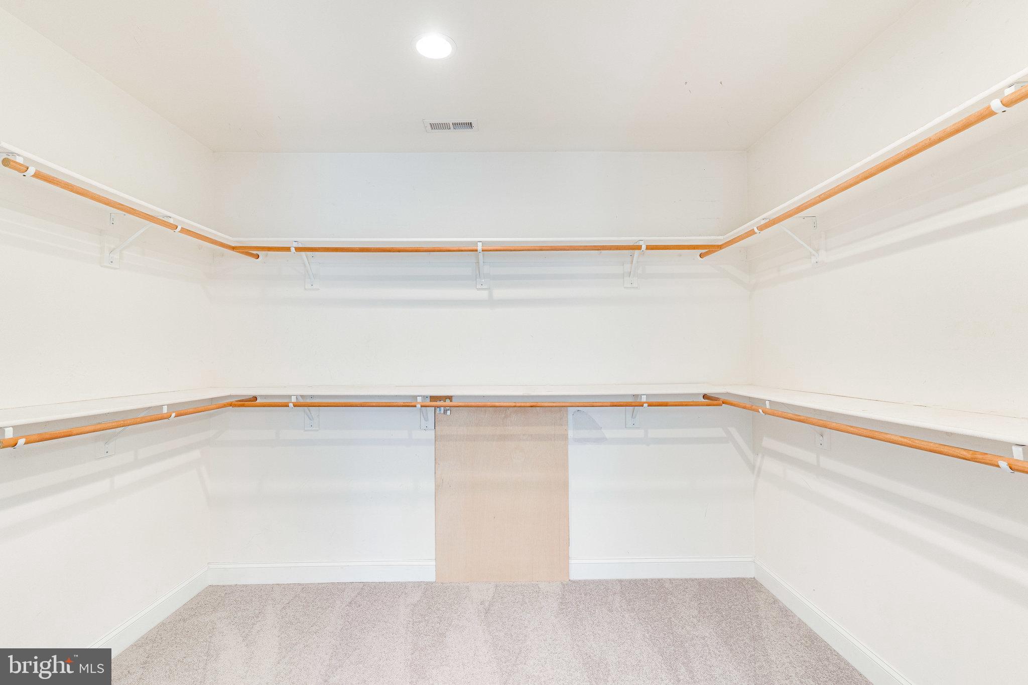 6825 Williamsburg Boulevard Arlington, VA 22213 - Photo 28 of 55 Primary bedroom walk-in closet