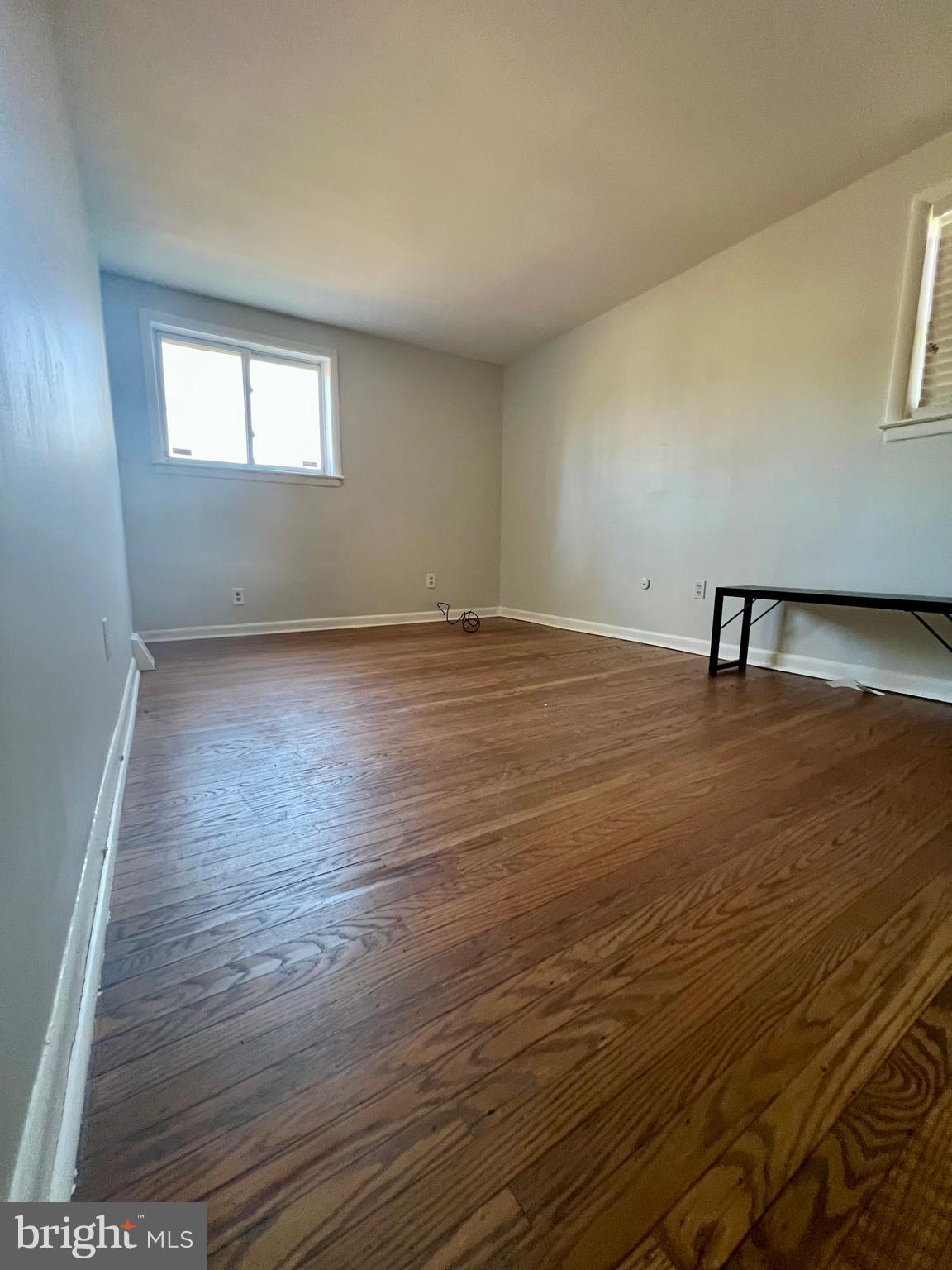 7201 Devon Street, Unit 1 Philadelphia, PA 19119 - Photo 11 of 13 a view of empty room with wooden floor