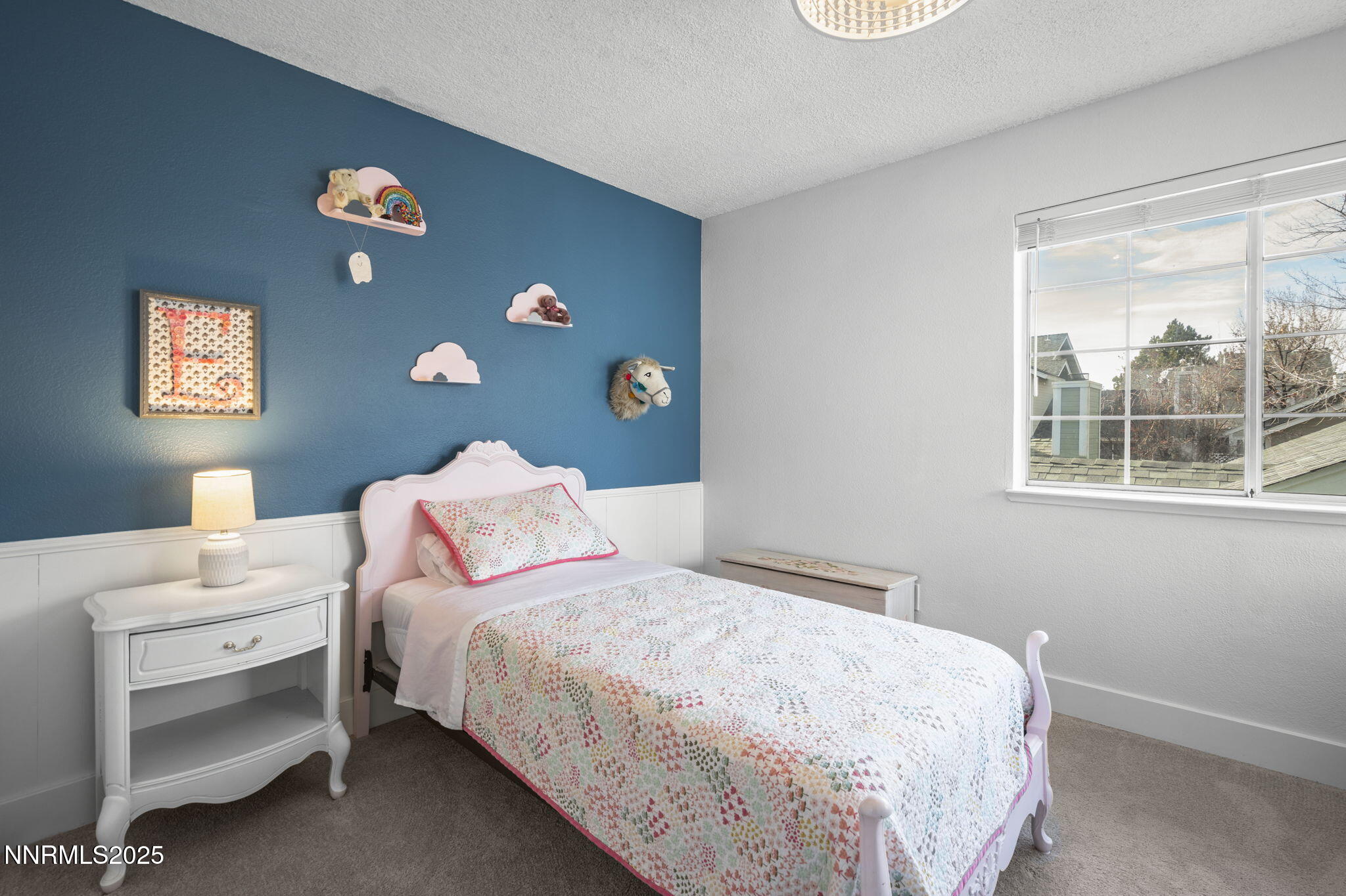 1911 East Minaret Circle Reno, NV 89523 - Photo 13 of 27 a bedroom with a bed and a window