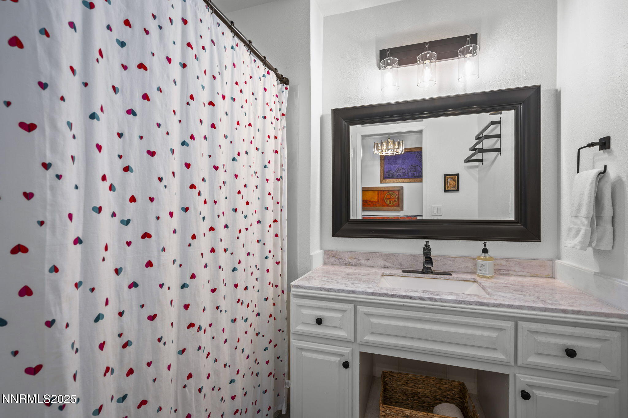 1911 East Minaret Circle Reno, NV 89523 - Photo 14 of 27 a bathroom with a sink and a mirror