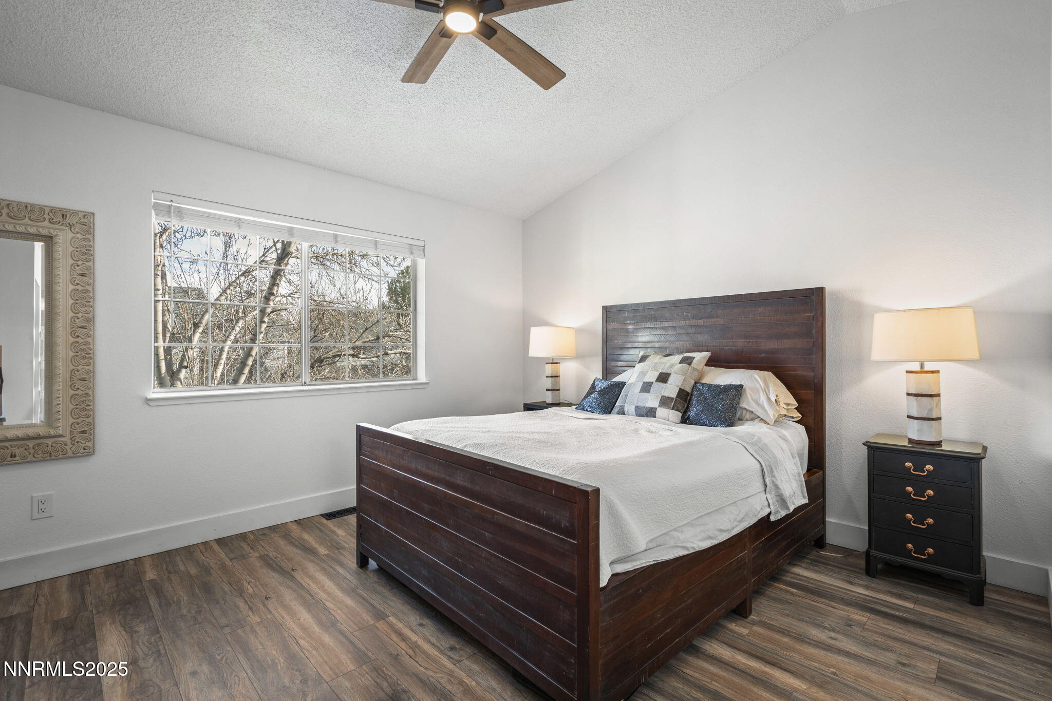 1911 East Minaret Circle Reno, NV 89523 - Photo 16 of 27 a bedroom with a bed and a window