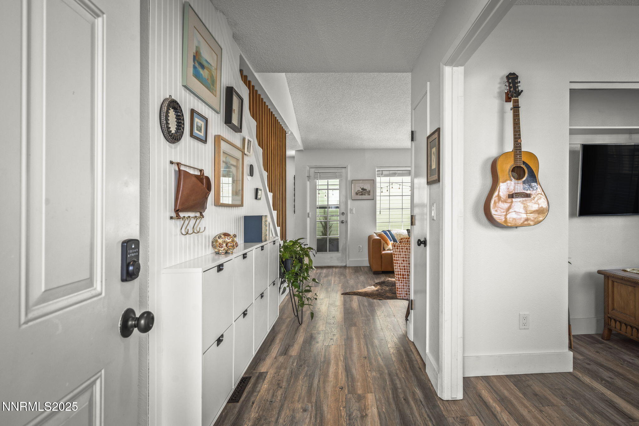 1911 East Minaret Circle Reno, NV 89523 - Photo 2 of 27 a hallway with wooden floor