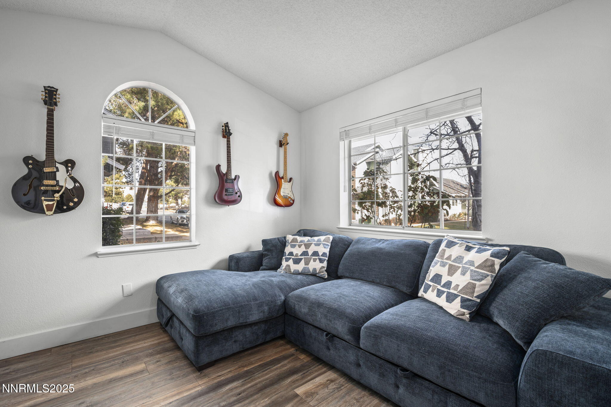 1911 East Minaret Circle Reno, NV 89523 - Photo 3 of 27 a living room with furniture and a large window