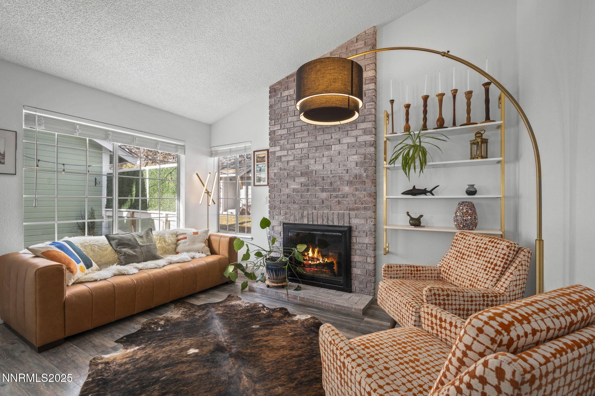 1911 East Minaret Circle Reno, NV 89523 - Photo 4 of 27 a living room with furniture and a fireplace