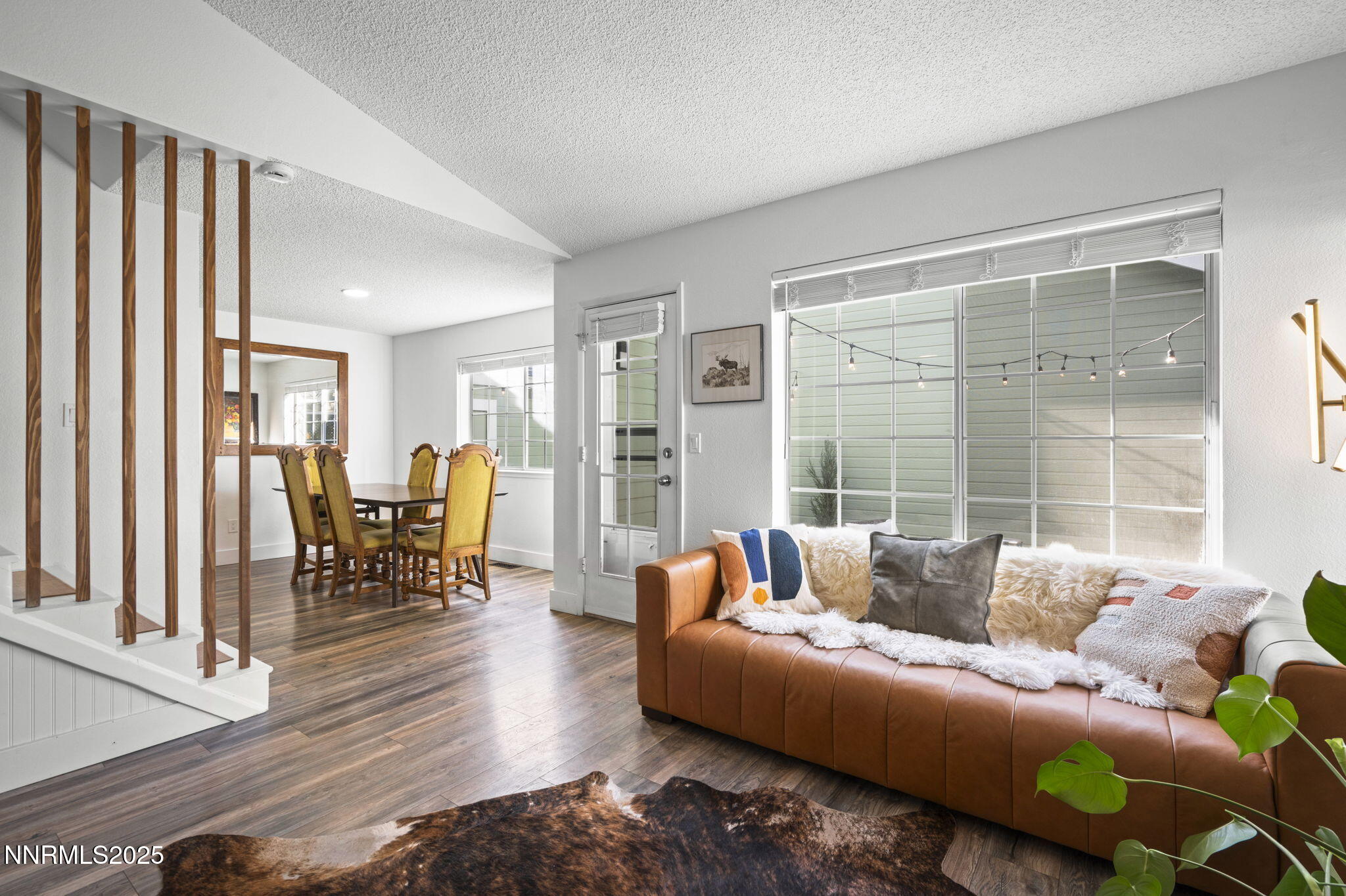 1911 East Minaret Circle Reno, NV 89523 - Photo 6 of 27 a living room with furniture and a large window