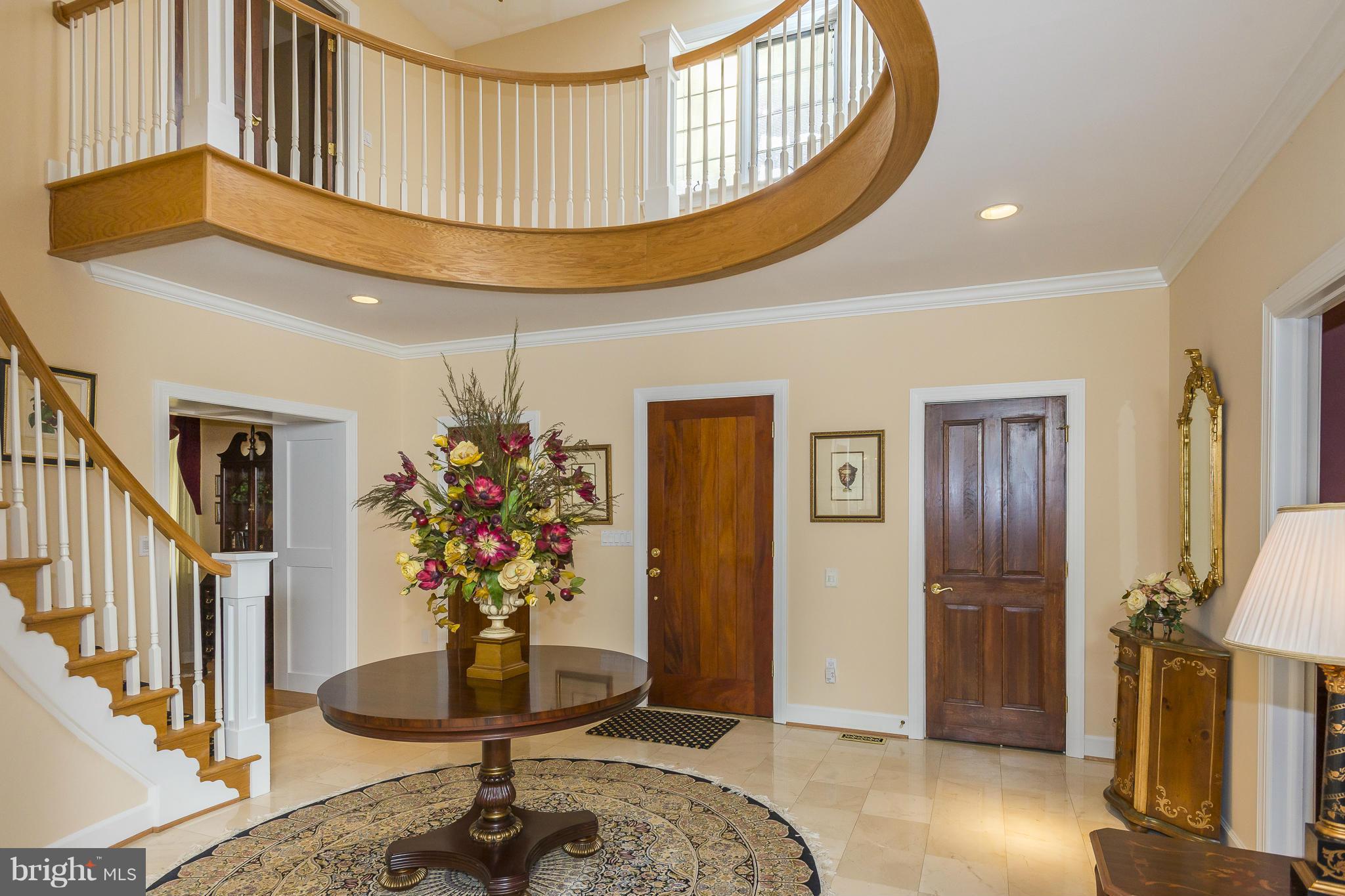 15822 Laughlin Lane Silver Spring, MD 20906 - Photo 3 of 30 Two Story Foyer with Circular Staircase