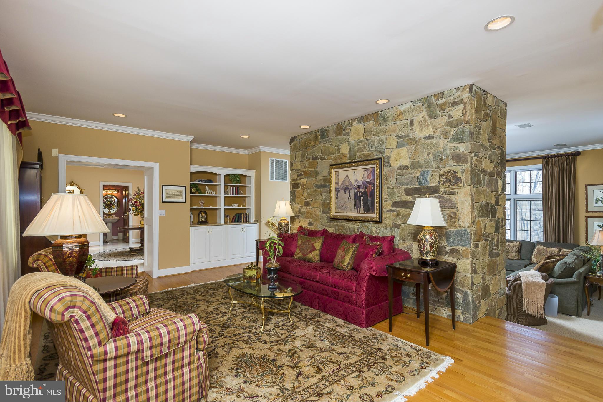 15822 Laughlin Lane Silver Spring, MD 20906 - Photo 5 of 30 Living Room with Eye-Catching Stone Wall