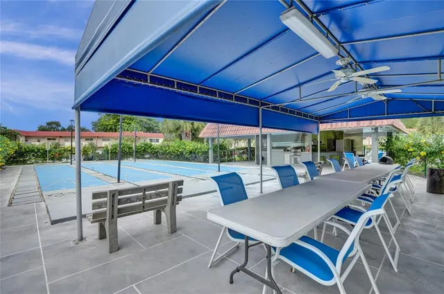 a view of yard with patio