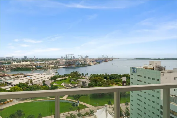 a view of a city and a lake