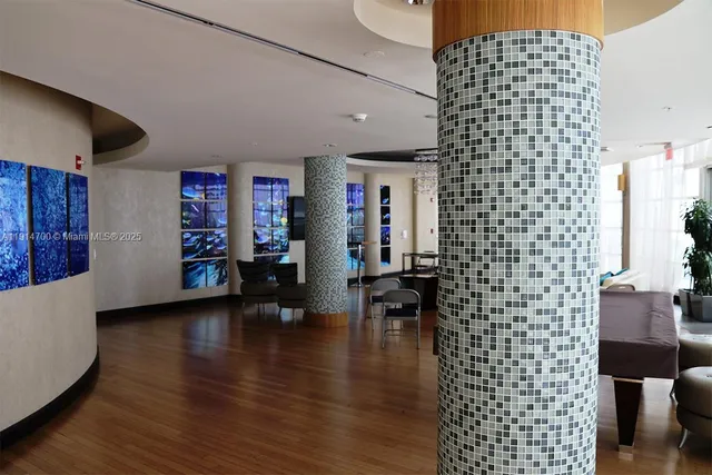 a view of livingroom with furniture and wooden floor