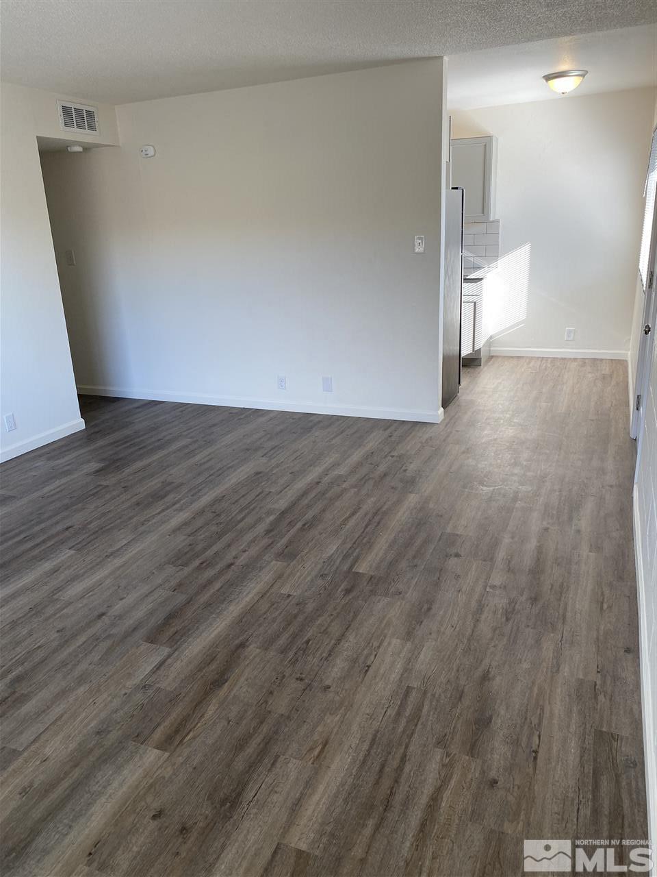 2197 Patton Drive Reno, NV 89512 - Photo 8 of 13 a view of a room with wooden floor