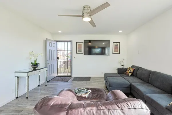 a living room with furniture and a window