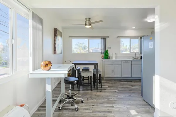 a view of a kitchen and dining room