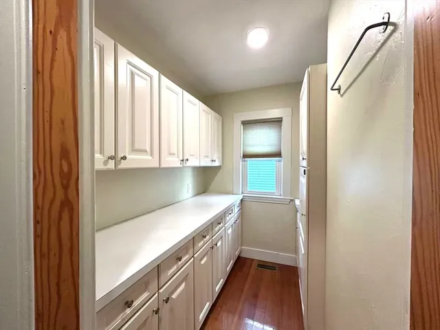 a view of a kitchen with a sink and dishwasher