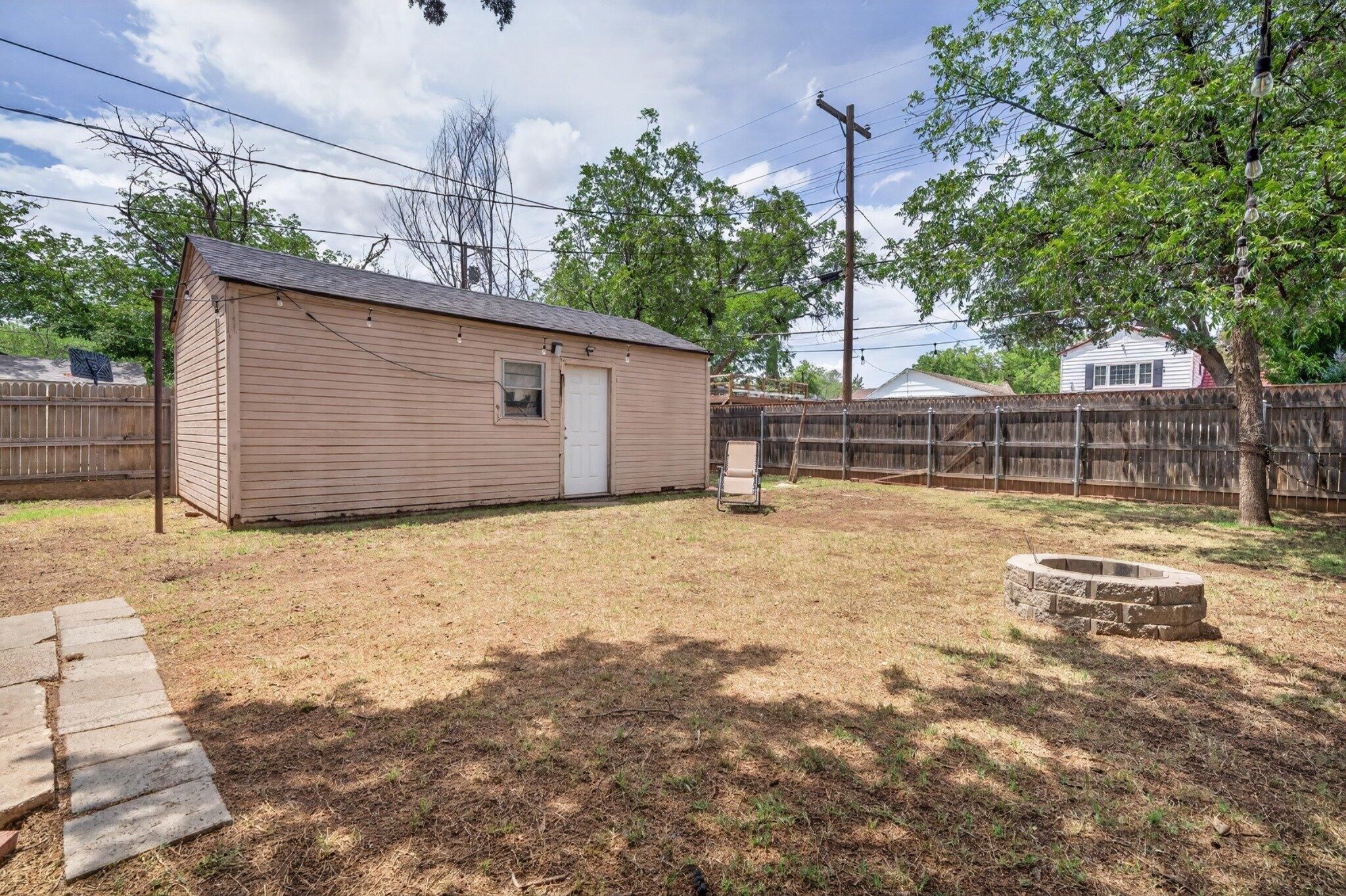 2212 22nd Street Lubbock, TX 79411 - Photo 14 of 14 a view of backyard with large tree
